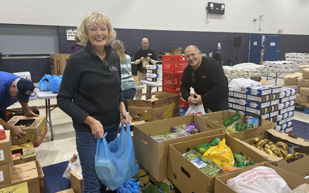ACF staff and board volunteering at OPEN M