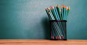 Pencils in pencil holder on desk