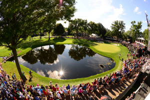 Crowd gathered around pond at a golf course for Gay Games in Northeast Ohio