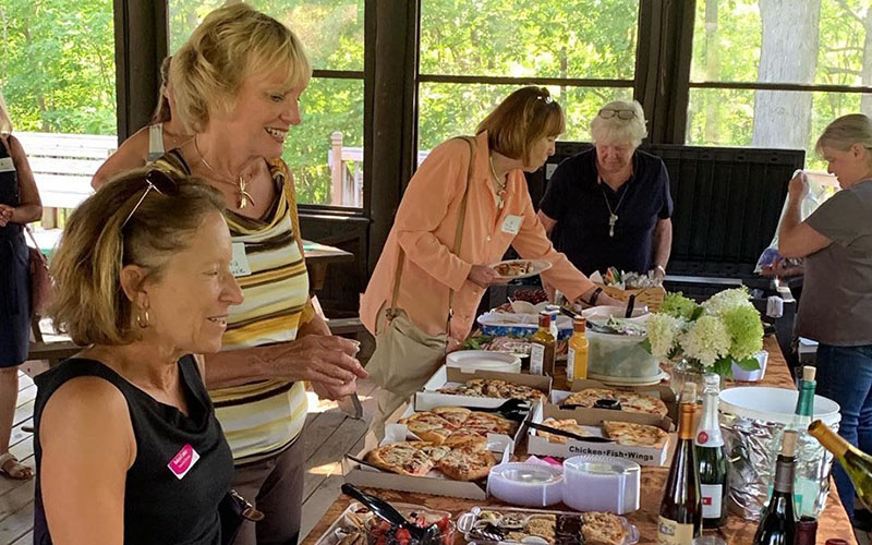 Women at a buffet table