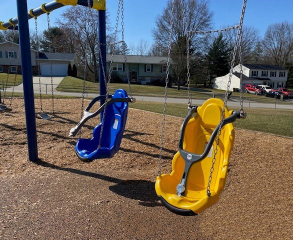 Two swings on a playground