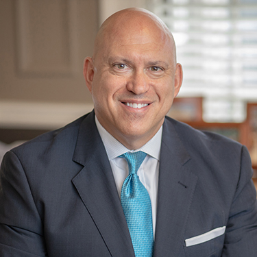 Jesse Hurst, CFP®, AIF®: President<br>Impel Wealth Management