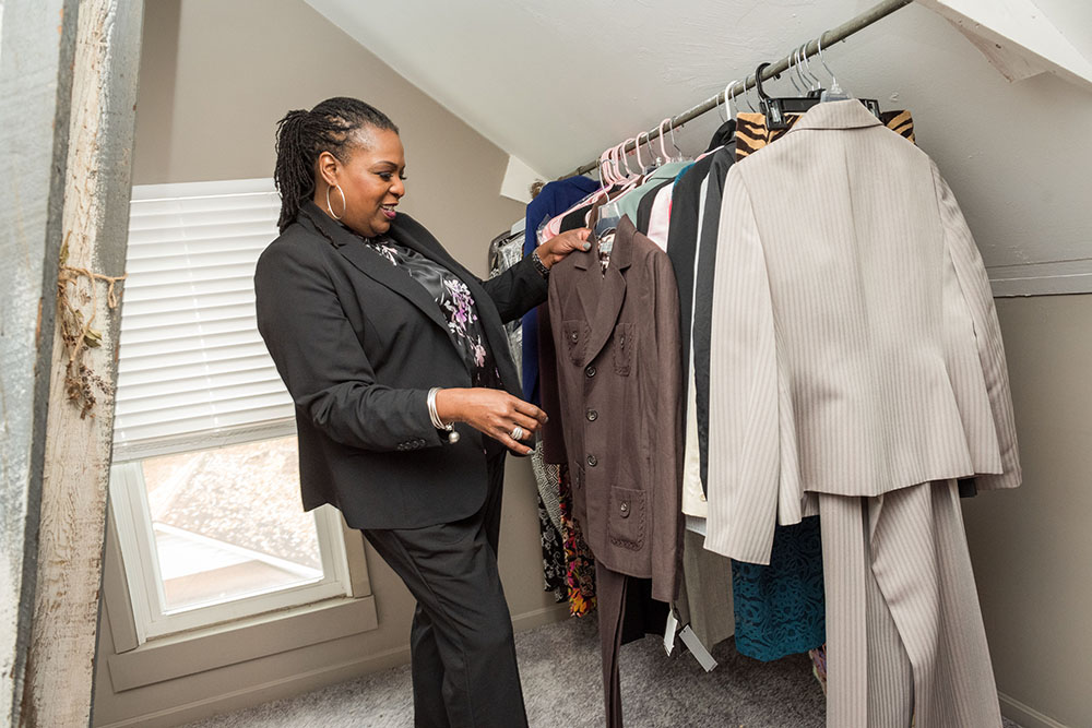 Woman looking at clothing rack