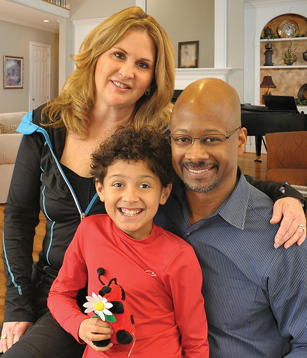 The Mathews family poses for a photo