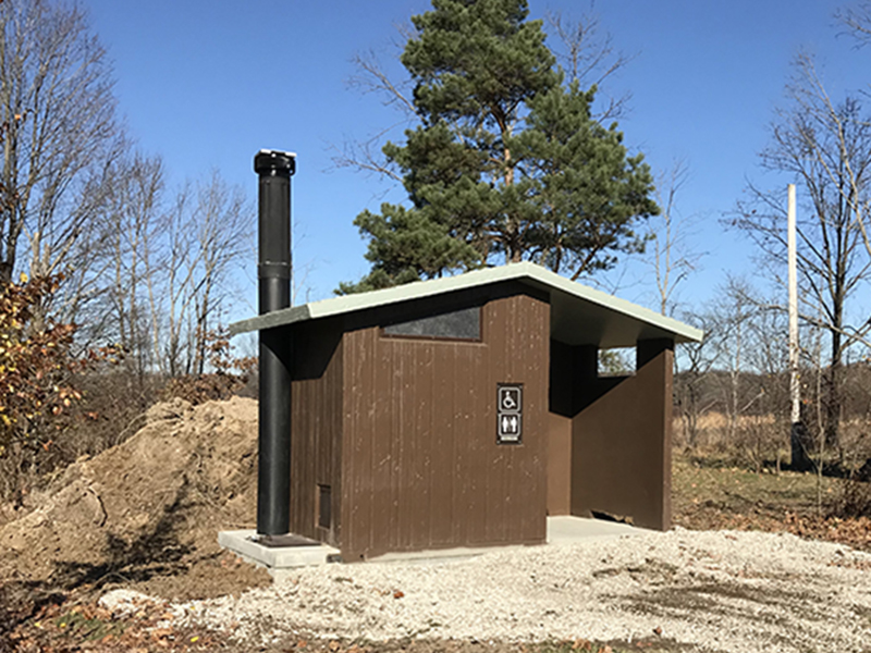 Brown outdoor restroom exterior