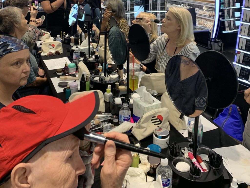 Cancer patients putting on makeup