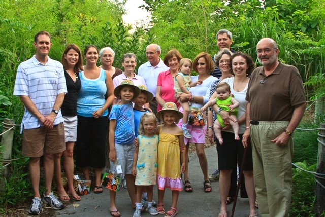 Large family smiling for a group photo