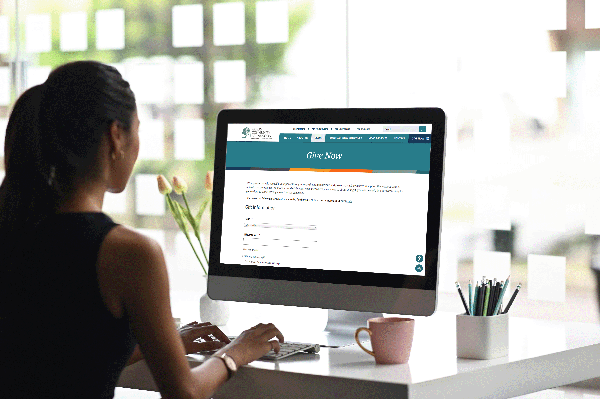 Woman looking at a computer screen