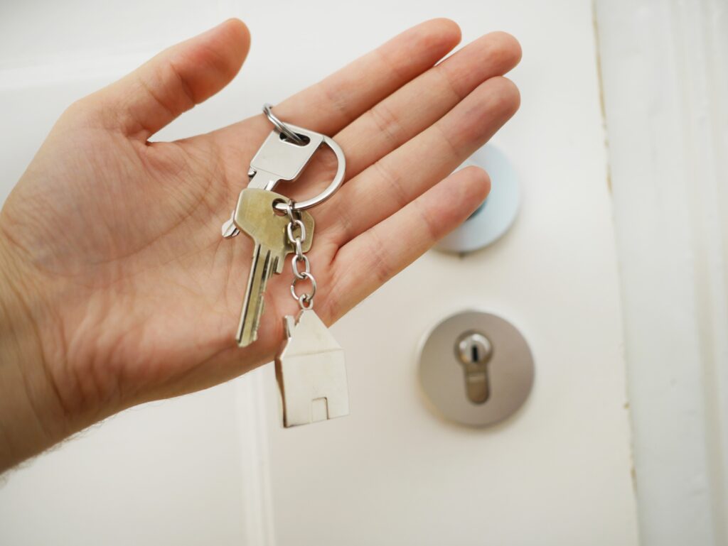 Hand holding a set of keys