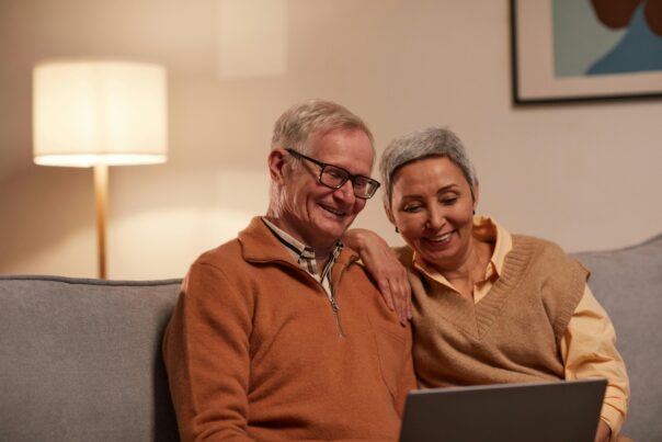 Older adults looking at a computer