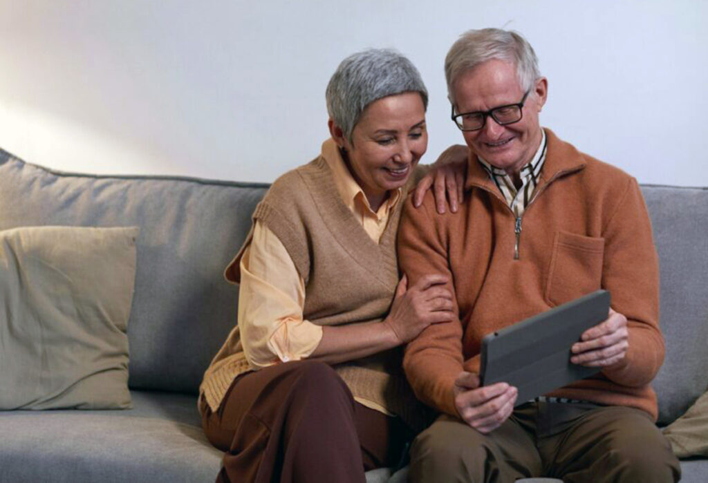 Older couple looking at a tablet screen