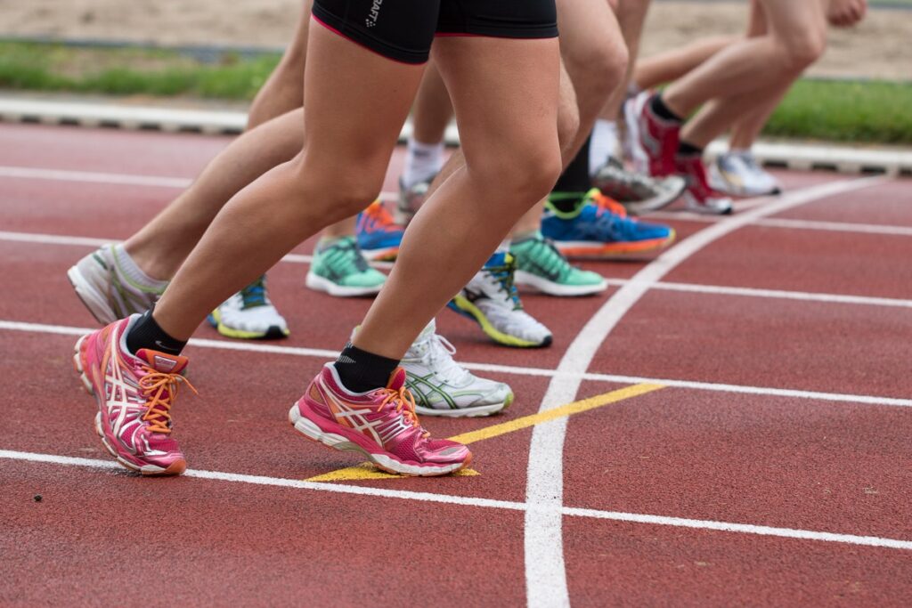 Legs of runners at the starting line