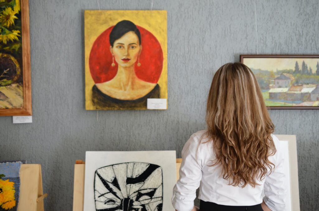 Woman looking at art gallery