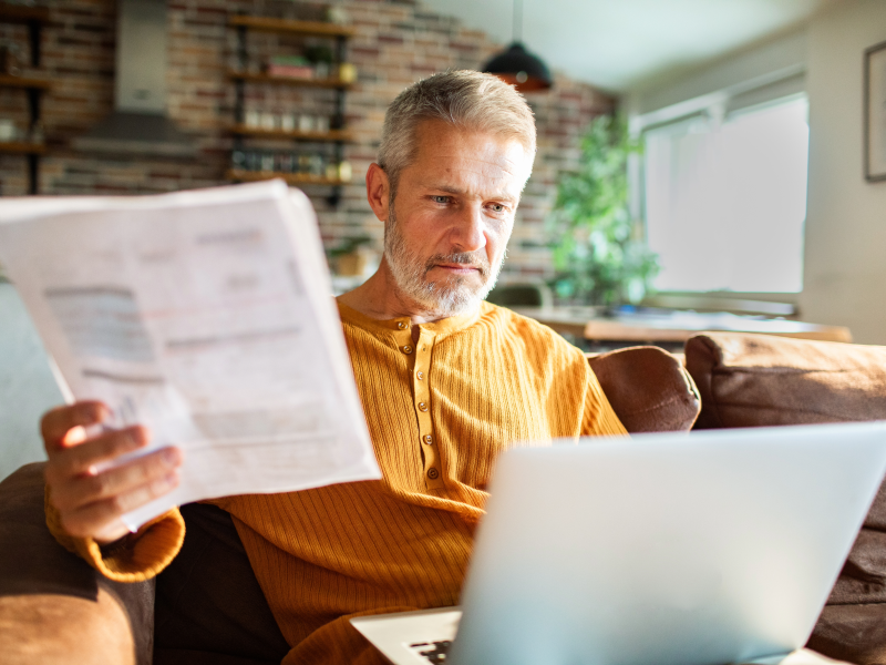 Man looking through documents