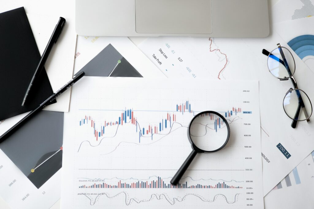 stock graph with magnifying glass