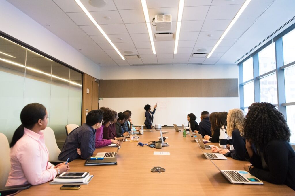 People around a board room table